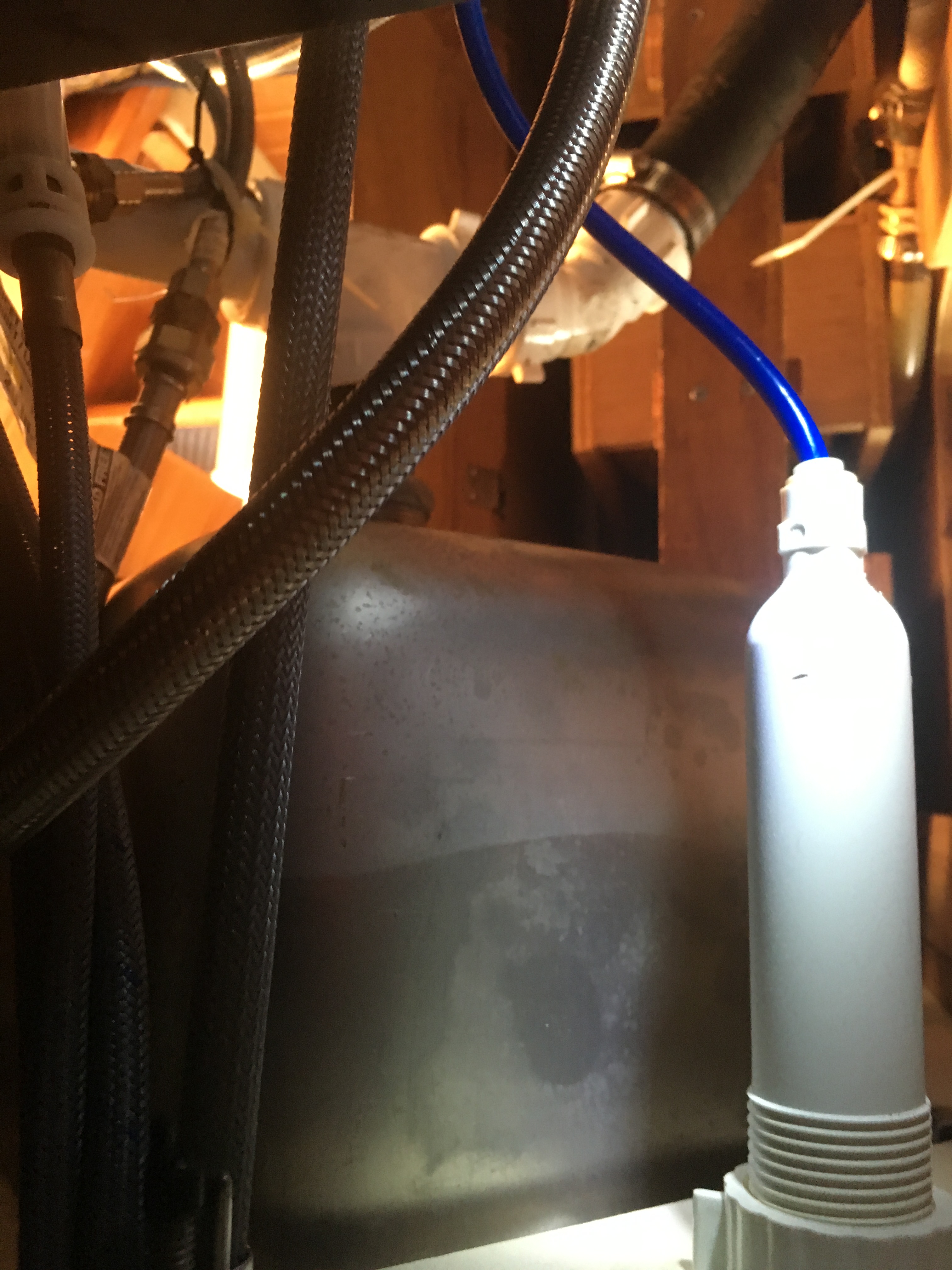 What you see under the sink of a 40-foot sloop with a water filtration system.