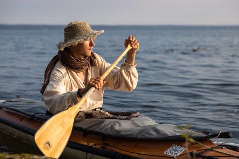 Peter Frank paddles canoe