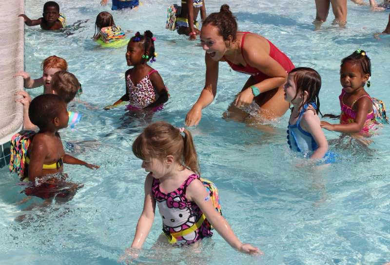 Foundation-sponsored SOS instructor teaches children how to swim at the Bay Hundred Community Pool.)