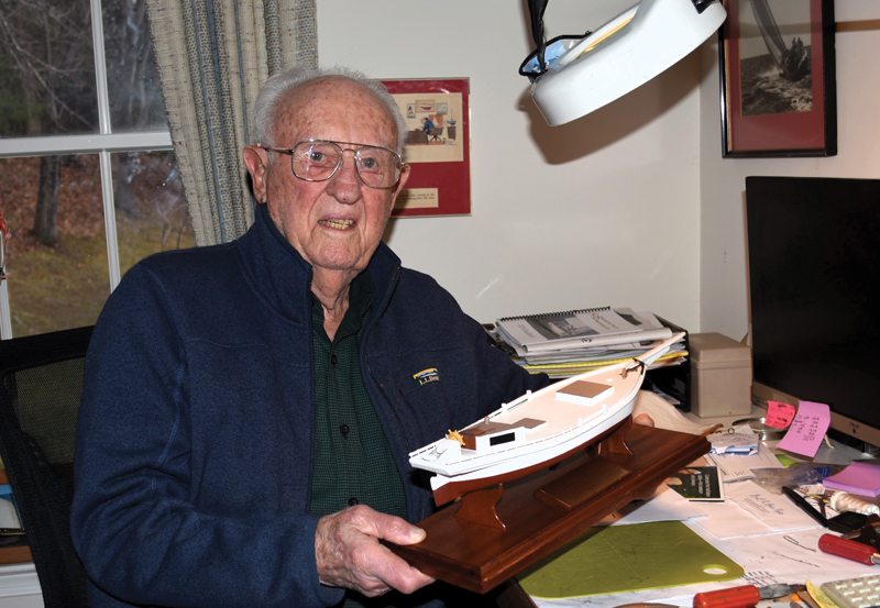 Rolph Townshend holding model boat