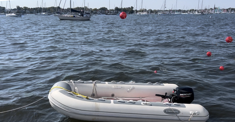 dinghy with balls in the air