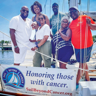 Sail Beyond Cancer guests on sailboat