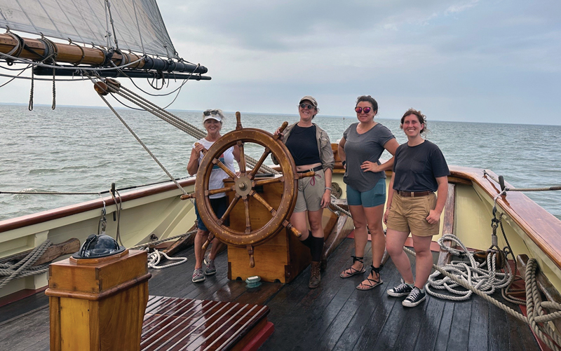 crew of four women at helm of Pride of Baltimore II