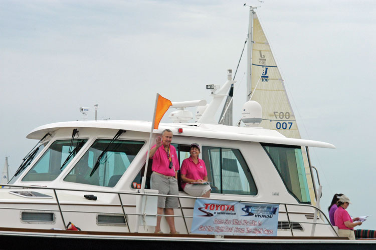 Hampton YC PRO John McCarthy with his wife Lin on RC at the Screwpile Regatta.